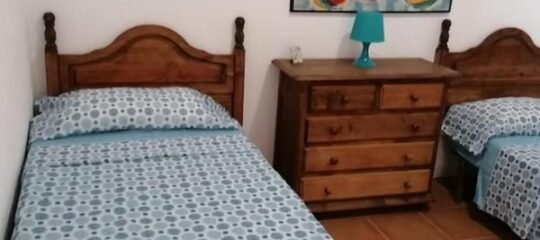 Kamer op de begane grond met 2 eenpersoonsbedden